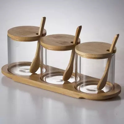 Set of 3 Glass Jars with Bamboo Lids and Spoon on a Bamboo Tray